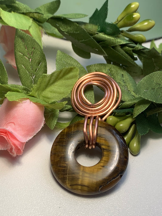 Tigers eye wrapped copper pendant