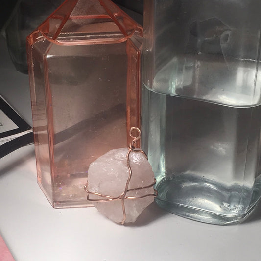 Raw Rose quartz copper wire wrapped pendant